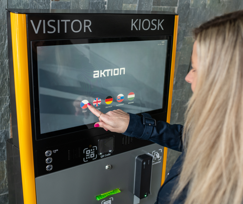 kiosk a woman touching a screen